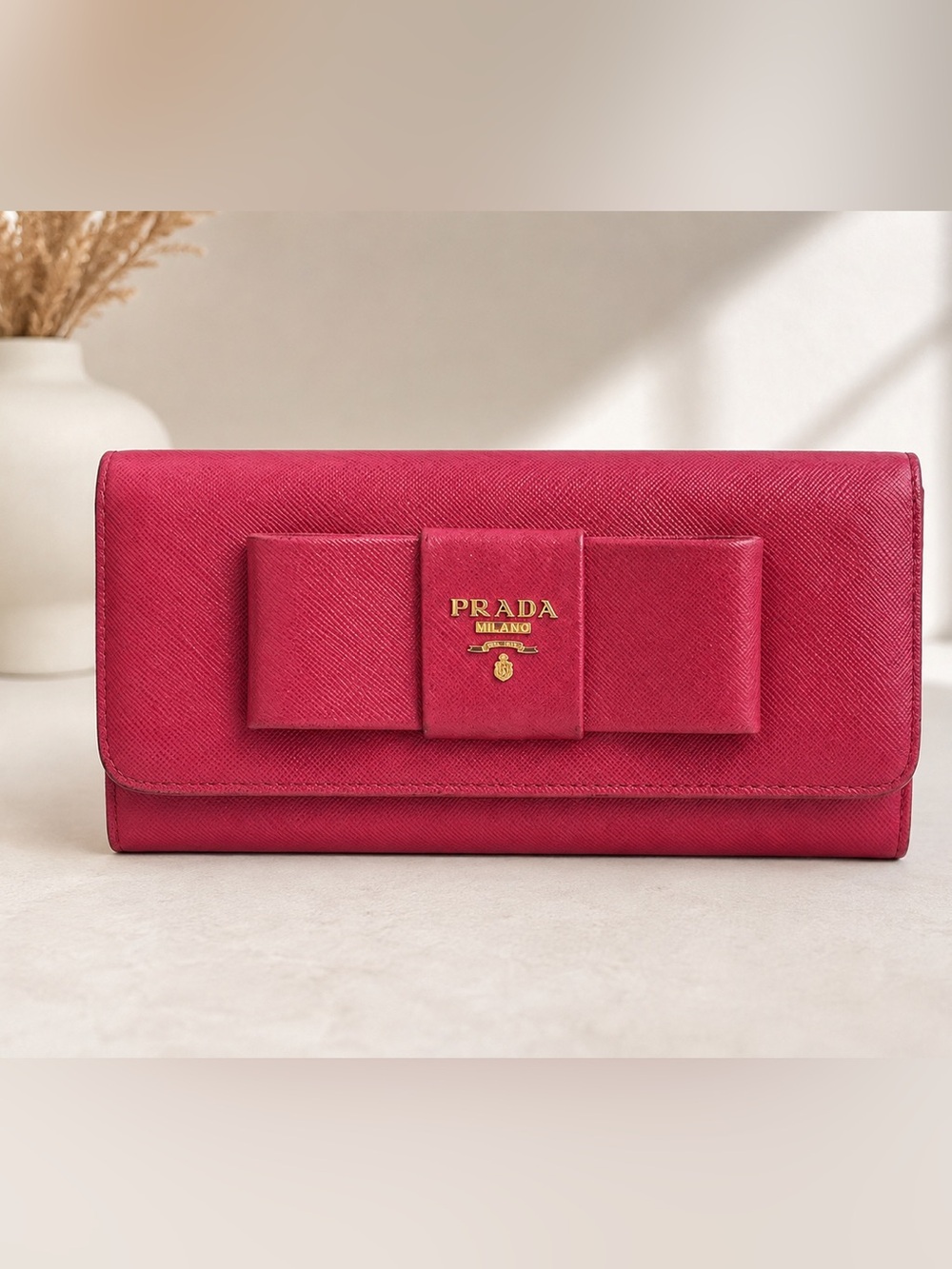 Prada bow-detail Saffiano continental wallet - pink